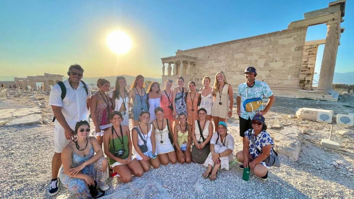 The girls water polo team poses for a picture at a sightseeing tour in Athens. (Photo Credit: Girls' Tour Guide)