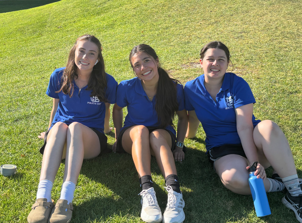 Ashley Beltrama [12], Peighton Lopez [11], Sammy Nishihama [12] having a break on the green. 