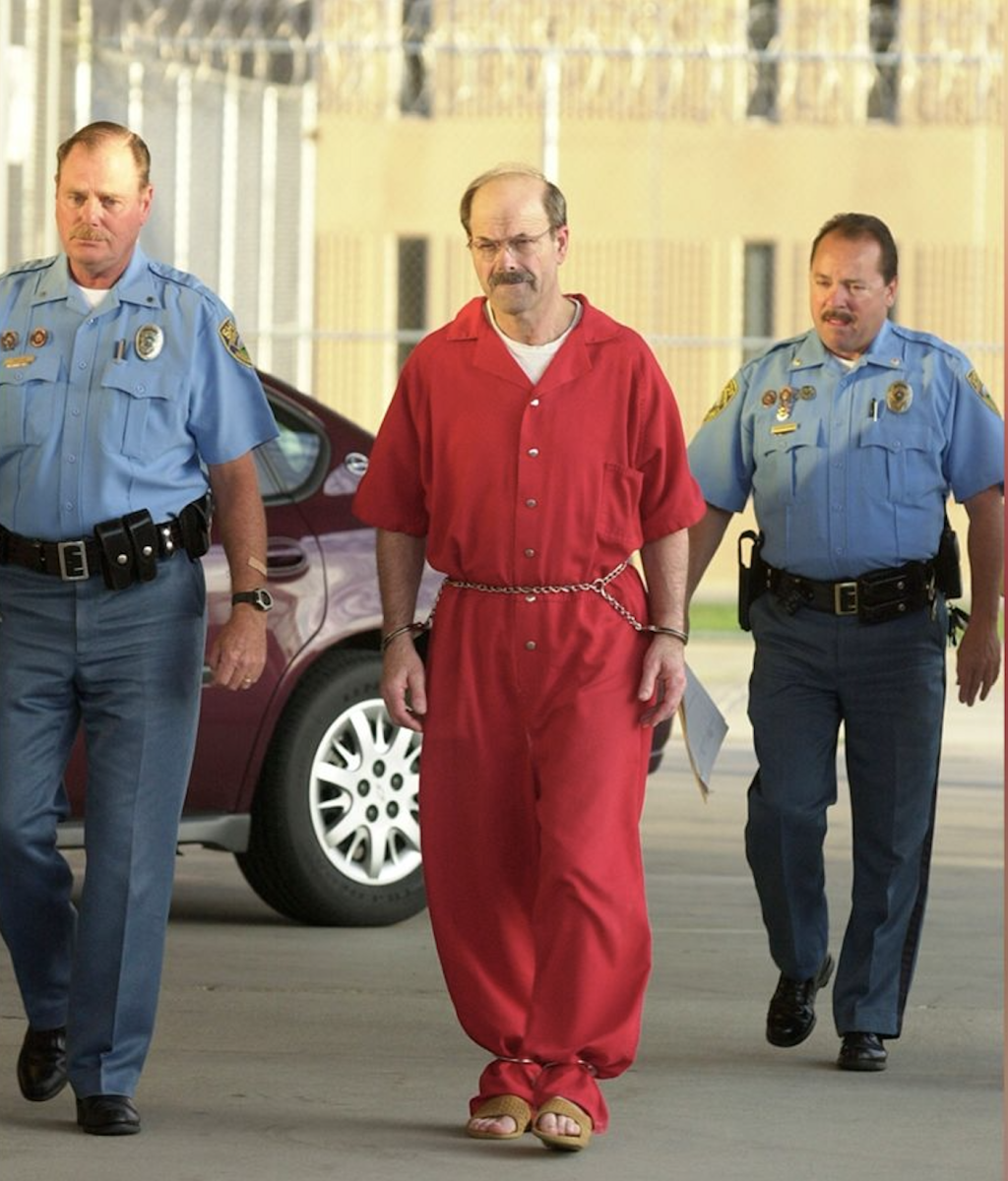 Dennis Rader, the BTK Killer, being arrested 
