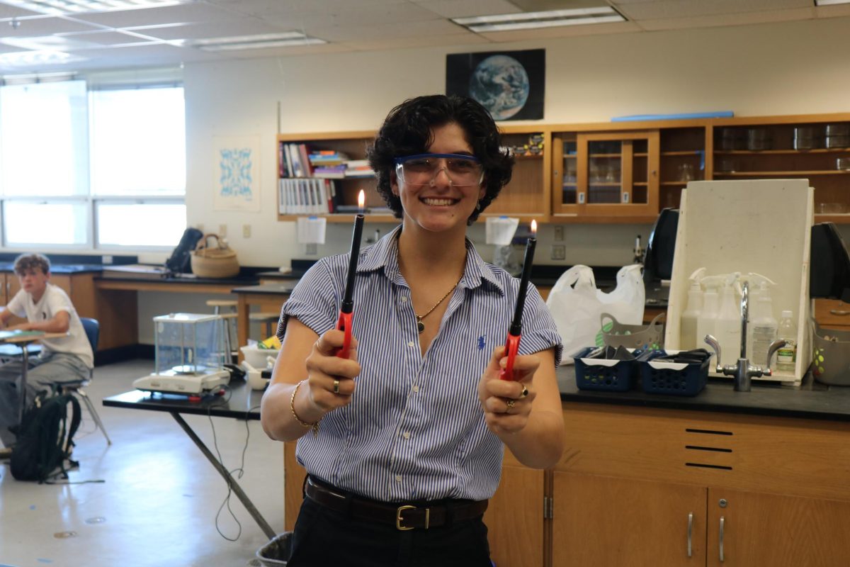 Ms. Niknafs preparing for a lesson in biology.
