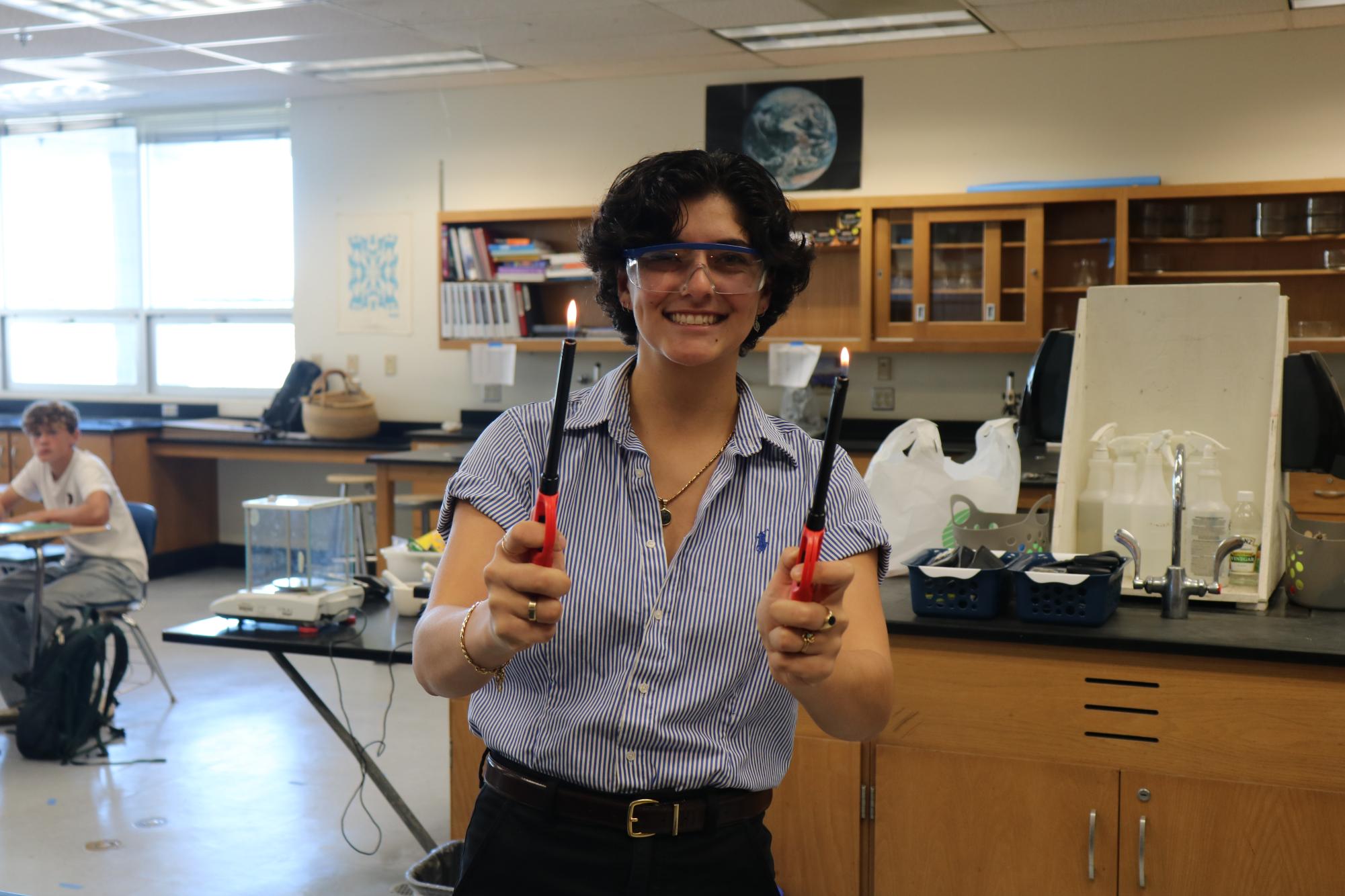 Ms. Niknafs preparing for a lesson in biology.