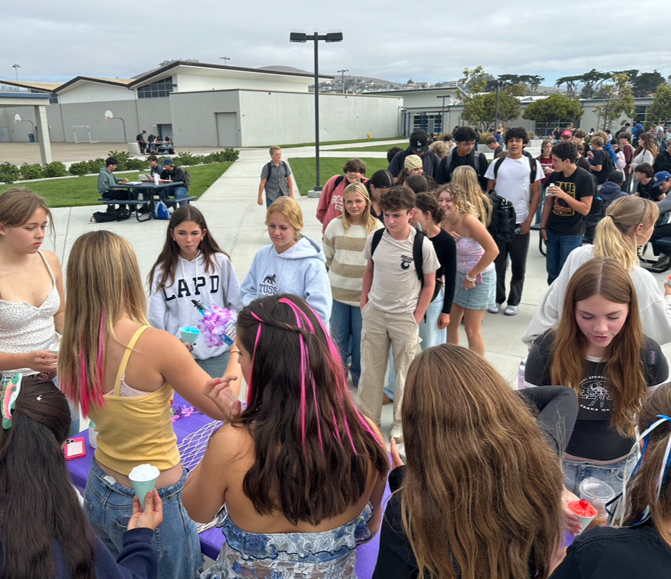 ASB serving snow cones during nutrition.