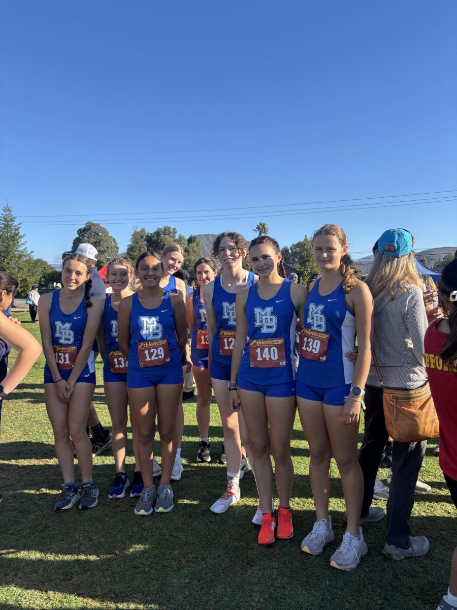 Cross Country runners take a group photo after a successful run.