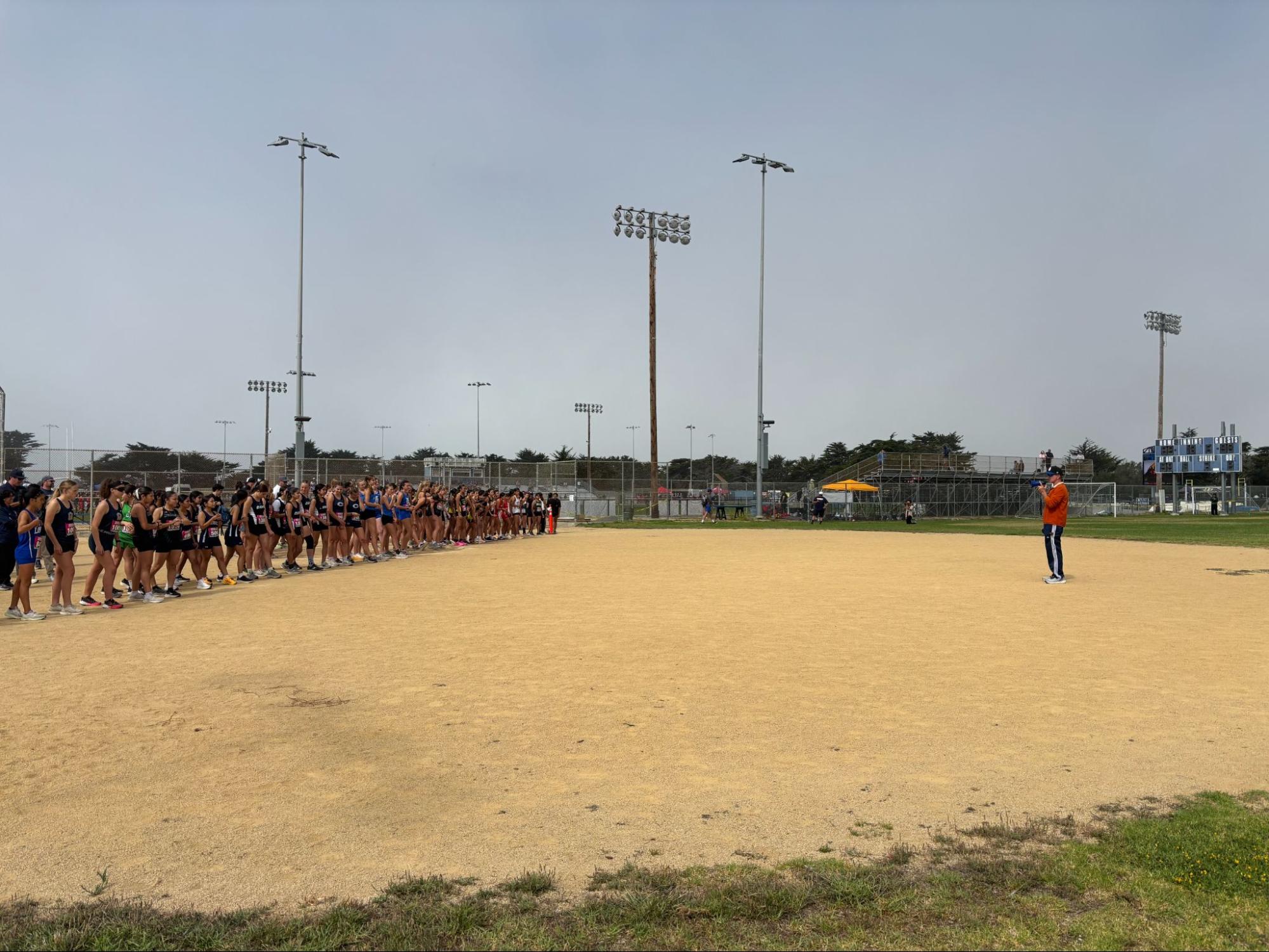 Runners listen to instructions.
(Photo Credit: Coach Jennifer Frere)