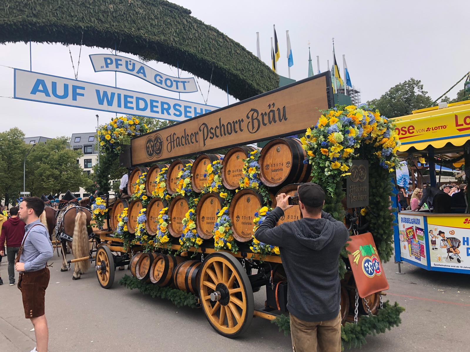 The Oktoberfest parade featured a decorated horse-drawn carriage loaded with beer barrels. (Credit: Marco Kraatz)
