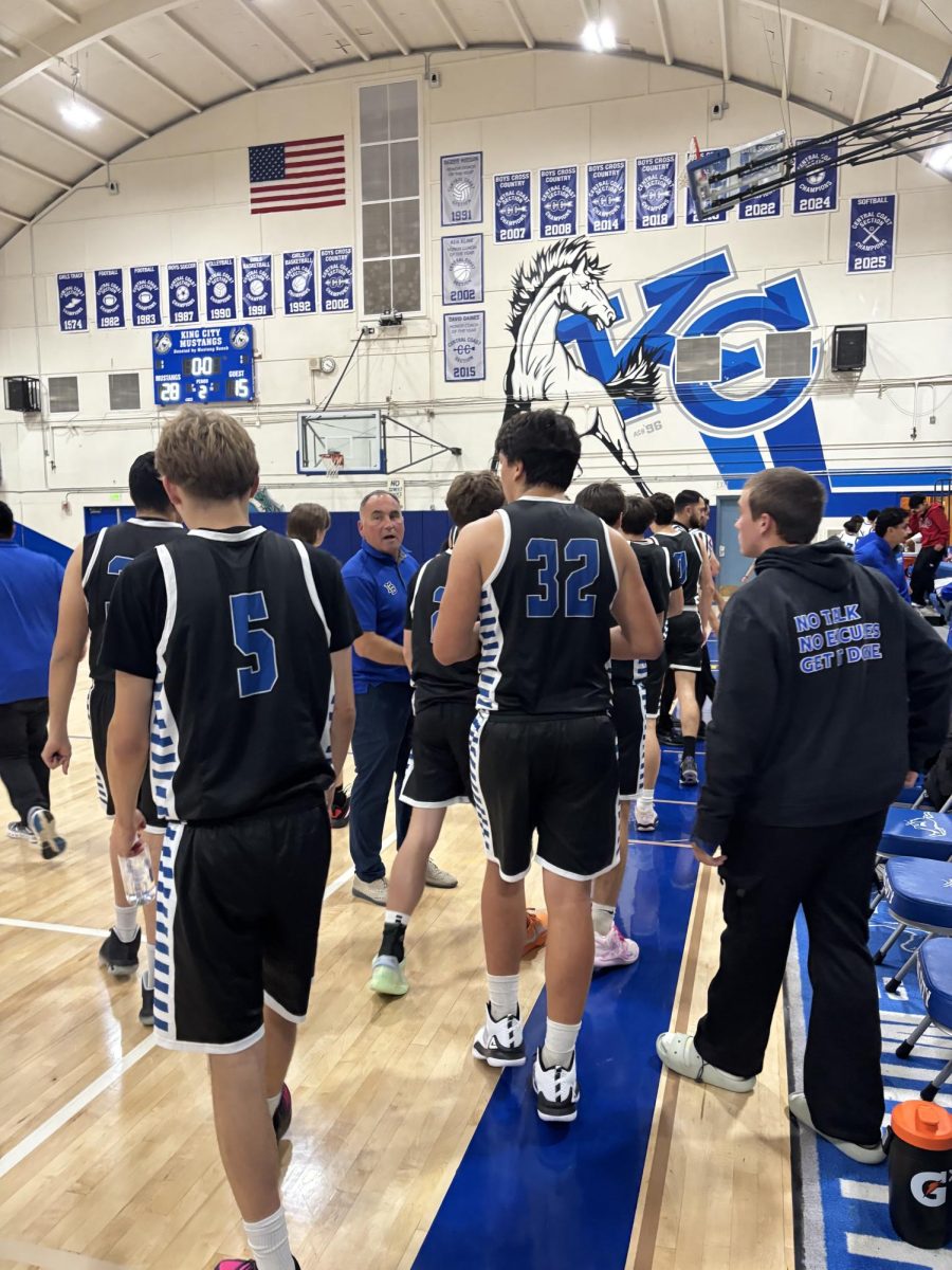 Coach dougherty get his team onto the court to begin the second quarter (Credit: Avery Raya)
