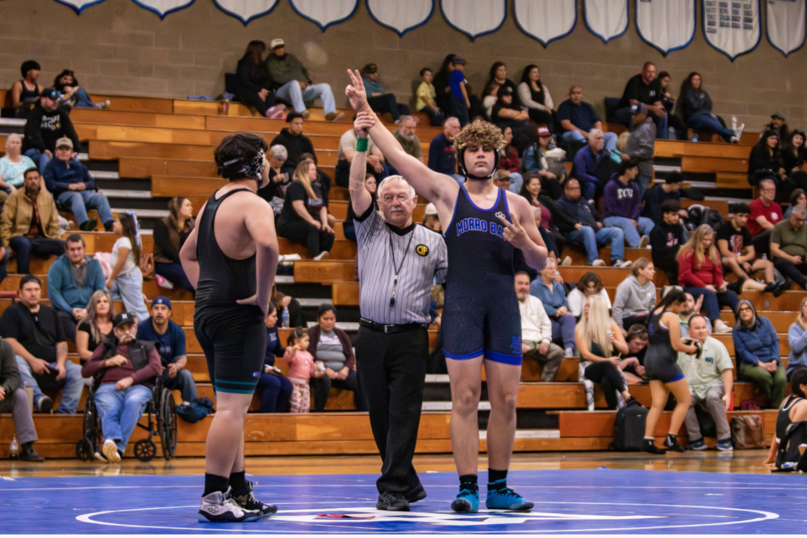 Boys Pirate Wrestler, Owen Trujillo, winning a match.