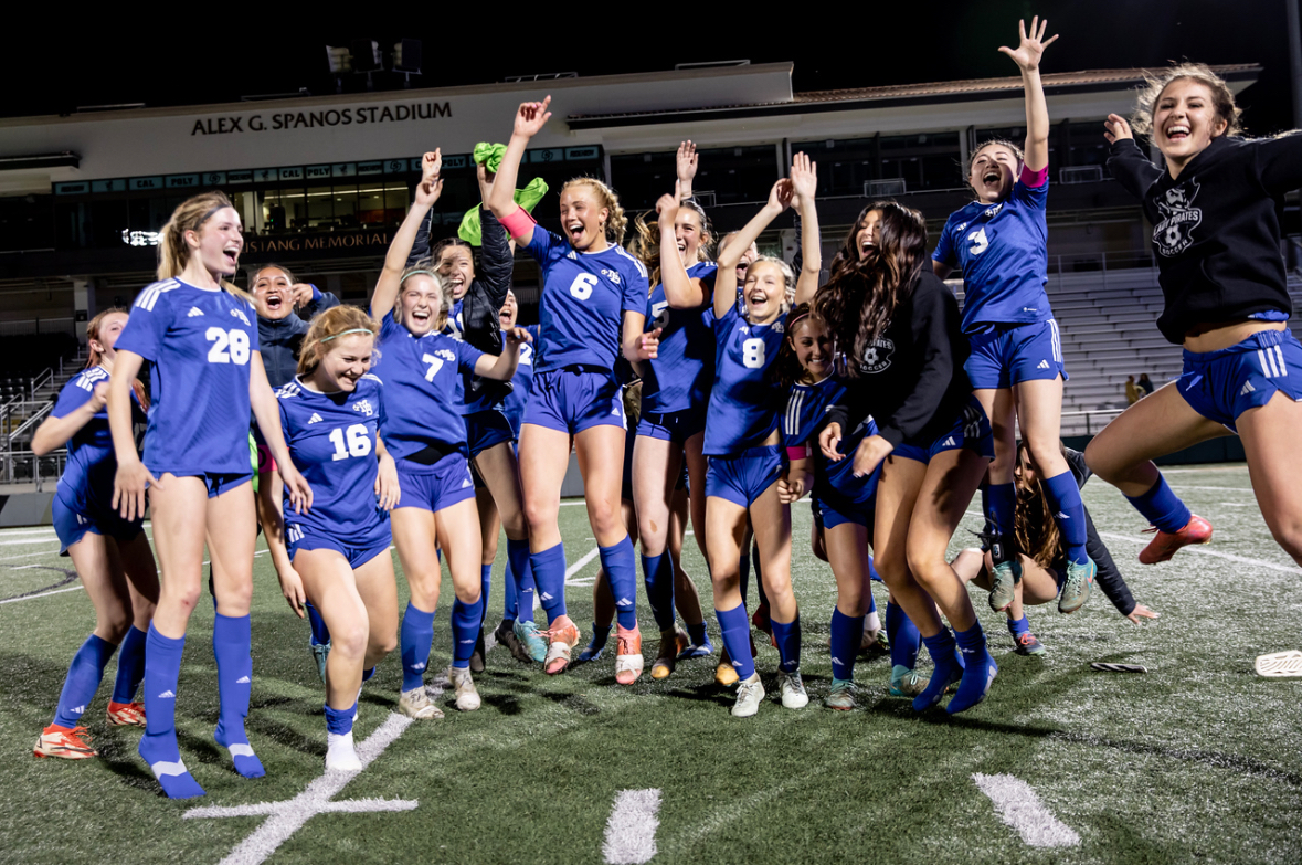 The team celebrates after their win (Photo Credit: Kori Kristine)